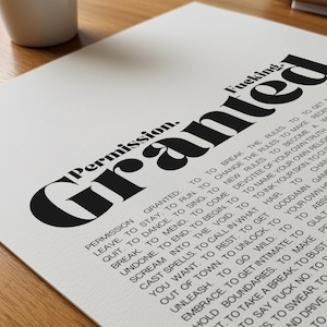 May include: A white print with the words "Permission Granted" in large, bold, black letters. The word "Fucking" is above "Granted". Smaller text below lists permissions like "to break the rules" and "to go wild."
