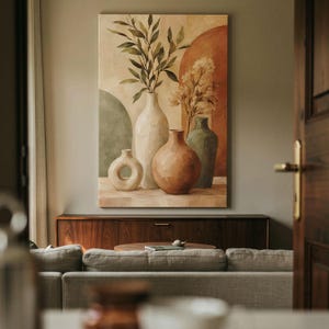 May include: A rectangular wall art print featuring a still life composition of four ceramic vases in varying shapes and sizes. The color palette includes muted tones of cream, terracotta, and sage green, with leafy branches and floral stems.