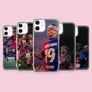 May include: Five clear smartphone cases featuring photographic prints of a football player wearing a blue and red jersey with the number 19 and the name Lamine Yamal. The images show the player celebrating, holding a trophy, and on the pitch.