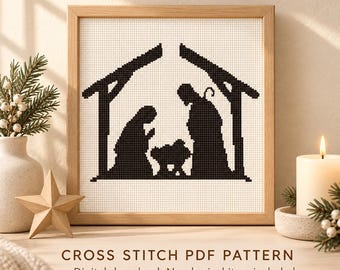 Op de afbeelding: Een kruissteekpatroon met een zwarte silhouet van een kerststal in een stal, ingelijst in licht hout. De tekst luidt CROSS STITCH PDF PATTERN. Digital download. No physical item included.