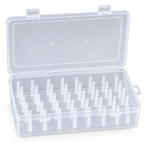 May include: A clear rectangular plastic storage box with an attached hinged lid. The interior base features multiple vertical, tapered pegs arranged in rows, designed to hold small items upright within the transparent container.
