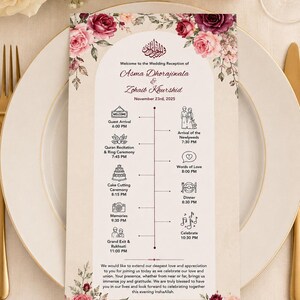 以下が含まれることがあります： バーガンディとピンクのバラのフローラルボーダーが施された結婚披露宴のプログラムカード。Asma DhorajiwalaとZohaib Khurshidの名前、2025年11月23日の日付、およびセレモニーのアイコン付きのイベントタイムラインが記載されています。