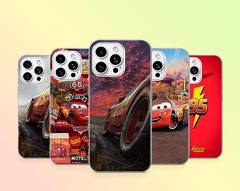 May include: Five smartphone cases featuring Lightning McQueen from the movie Cars. The designs include various scenes of the red race car, the number 95, a yellow lightning bolt, Route 66 signage, and Rust-eze branding on a vibrant red background.