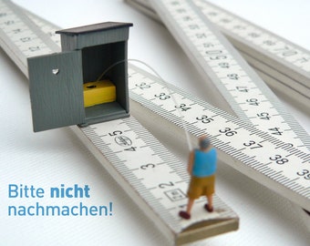 Stehpinkler – Foto auf Holz