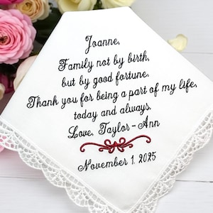 A beautiful white lace handkerchief with  embroidered text that reads: “Family not by birth, but by good fortune. Thank you for being a part of my life. today and always.” a perfect gift for a stepmother of the bride or groom! measures 12” x 12”. 100 % cotton. hand wash. lay flat to dry.