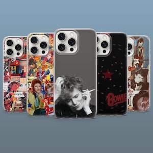 May include: Five smartphone cases featuring David Bowie imagery. Two cases display colorful photo collages of Bowie, one is a solid gray case with a black and white portrait of Bowie smoking, and two feature black backgrounds with red stars and text.