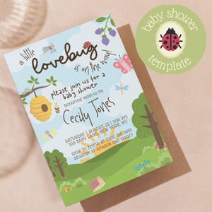 May include: A rectangular baby shower invitation card featuring a light blue sky and green landscape with illustrations of a beehive, snail, ladybug, butterfly, and trees. The text reads: a little lovebug is on the way! please join us for a baby shower honoring mom-to-be Cecily Jones, Saturday August 22 1:00 PM, 333 Baby Lane, New York, NY, RSVP to Emma at (555) 555-5555, Registry at Amazon and Target.