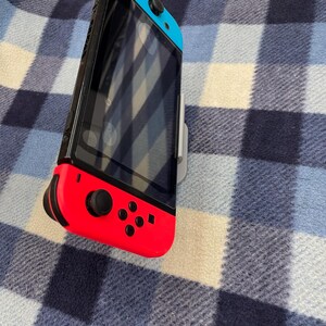 multi electronic stand (nintendo switch and iPhone not included)