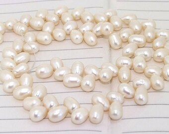 One Full Strand--- Barley  White Luster Pure Freshwater Pearl---6-8mm----about  77Pieces----15 inch strand