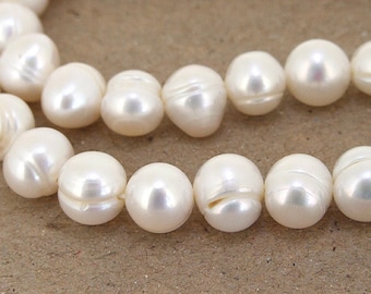 Luster Full One Strand----- Luster Pure Oval Baroque  White  Freshwater Pearl----9mmx8mm----about 46Pieces----15inch strand