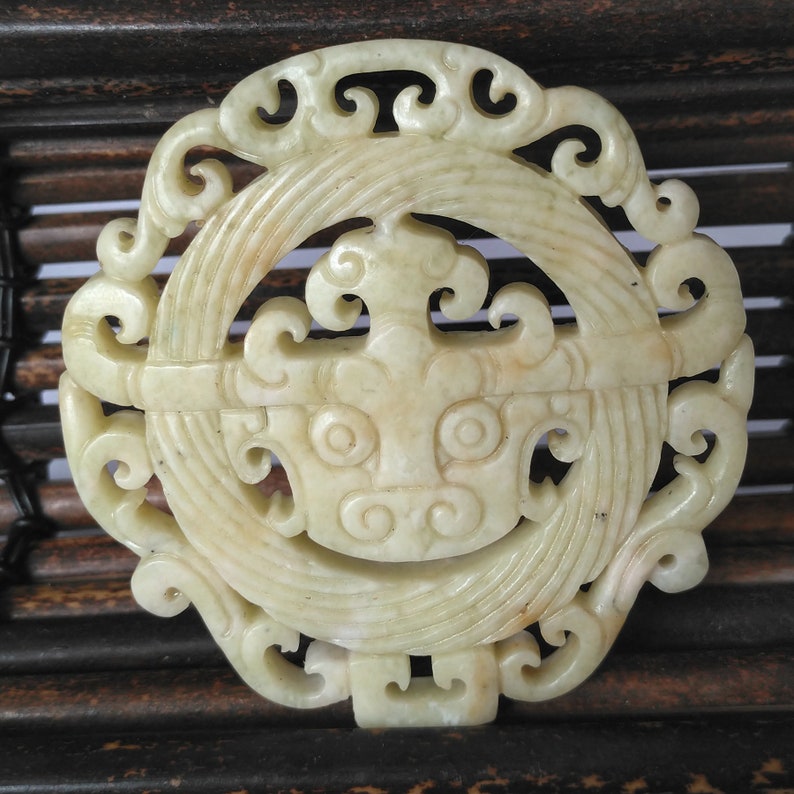 Carved Dragon face with Circle Pendant White Chinese Jade Amulet