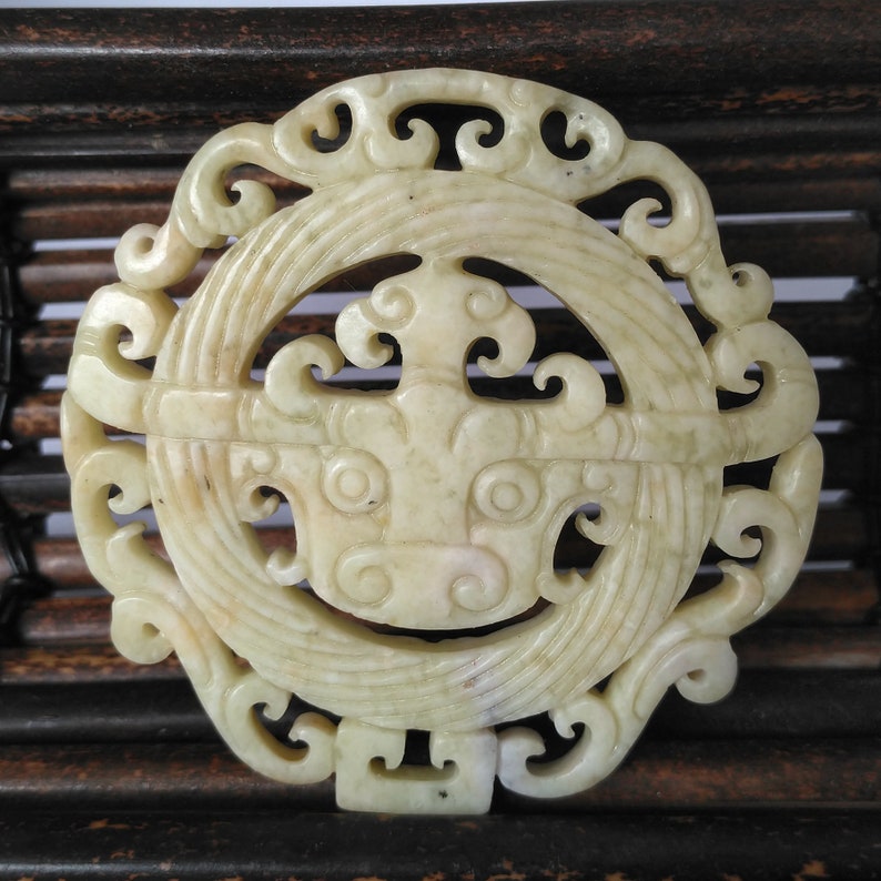 Carved Dragon face with Circle Pendant White Chinese Jade Amulet