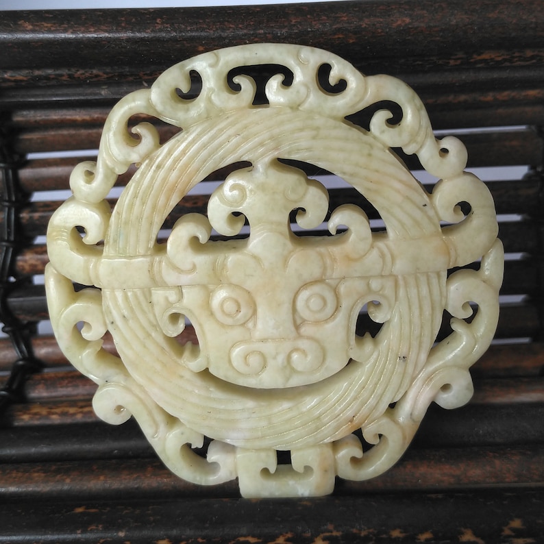 Carved Dragon face with Circle Pendant White Chinese Jade Amulet