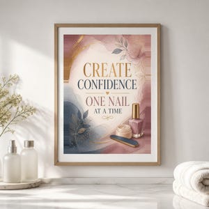 May include: A framed wall art print featuring an abstract watercolor background in shades of dusty rose, blue, and gold. The text reads CREATE CONFIDENCE ONE NAIL AT A TIME, accompanied by illustrations of a nail polish bottle and a nail file.