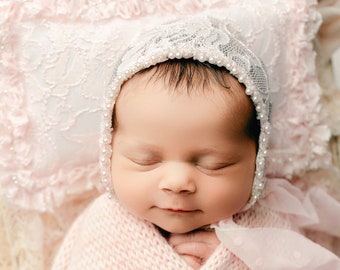 Lacy May - newborn bonnet in a soft pink lace with pearl trim and swiss dot chiffon ties