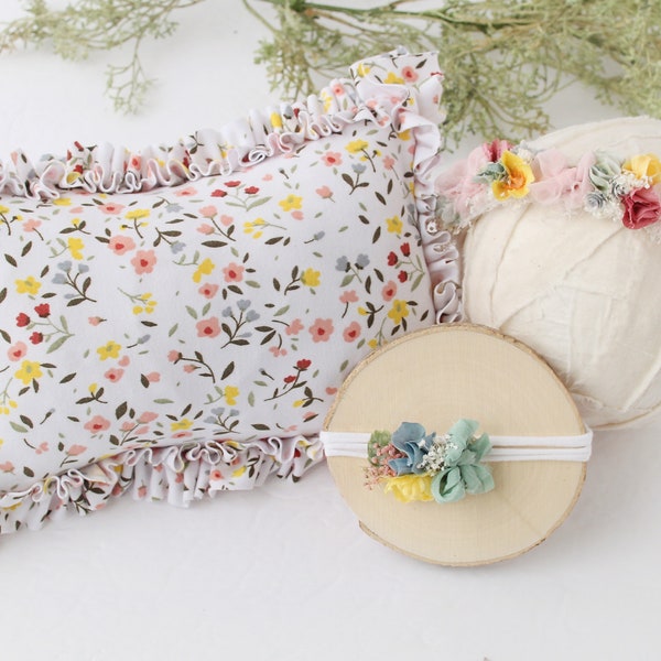 First Blossoms - newborn ruffle pillow sham in a floral print of raspberry pink, red, yellow, dusty blue and sage green