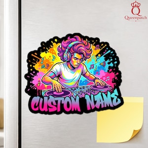 May include: A colorful sticker featuring a DJ with vibrant pink hair wearing headphones, mixing music on a console. The background is a splash of yellow, orange, and pink paint with musical notes. The text CUSTOM NAME appears in bold letters.