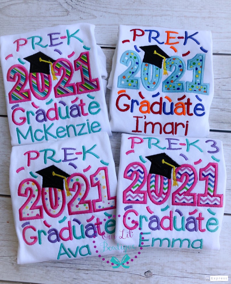 May include: Four white t-shirts with colorful embroidered designs that say "PRE-K 2021 Graduate" with a graduation cap and the names Mckenzie, Imari, Ava, and Emma.