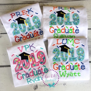 May include: Four white t-shirts with colorful embroidered designs for preschool graduation. The shirts feature the year 2019, a graduation cap, and the words "PREK Graduate", "VPK Graduate", "LUMC Graduate", and "Graduate".