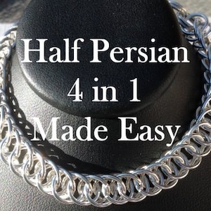 Può includere: Una collana a catena d'argento con un designo a metà persiano 4 in 1. La collana è esposta su un busto di manichino nero.