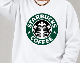 May include: A white long-sleeve crewneck sweatshirt featuring the green and white Starbucks Coffee circular logo printed on the center of the chest. The garment has ribbed cuffs and a ribbed hem, providing a clean and simple look.