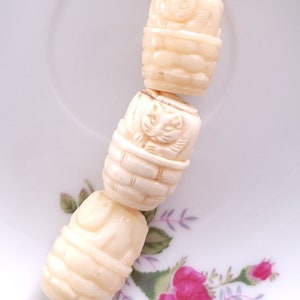 Hand Carved Bone Beads &quot;Cat in Basket&quot; Barrel Shaped 23x17x13mm