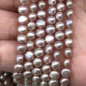 Perlas rosas de 5-5,5 mm con forma de botón perforado lateralmente, tira de 16&quot;