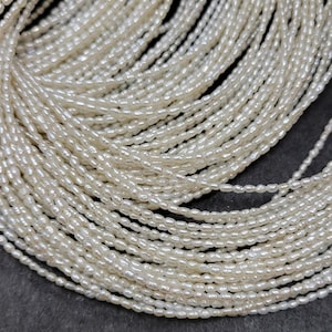 Tiny Seed Pearls White 1.5-3mm Pearls Rice Shape 15&quot; Strand