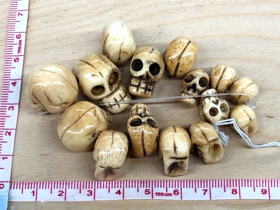 Hand Carved Vintage Bone Beads Assorted size skulls 15 pieces