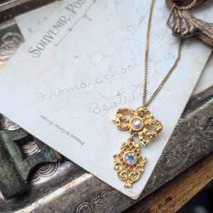 vintage goldtone necklace ornate bow with gemstones