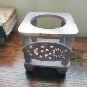 Vintage sun and moon design candle holder
