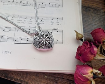 silvertone Brighton heart locket long pendant necklace with intricate design