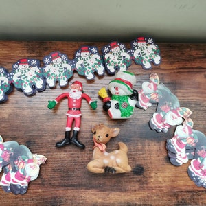 Vintage Christmas lot includes Santa paper garland snowman ornament reindeer and rubber santa