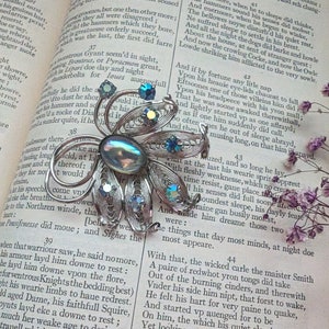 stunning vintage silver brooch with blue gemstones
