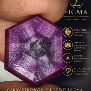 May include: A hexagonal, deep magenta-colored gemstone with a textured, crystalline surface. The image includes text: SIGMA, STRENGTH. BEAUTY. ENERGY., STRENGTH Boosts Confidence & Courage, BALANCE Promotes Peace & Emotional Balance, ENERGY Enhances Positivity & Vitality, NATURAL BEAUTY 100% Natural Premium Quality, CARRY STRENGTH. SHINE WITH SIGMA., NATURAL GEMSTONE | PREMIUM QUALITY | POSITIVE ENERGY, Made by Nature. Chosen for You.