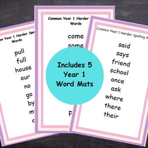 May include: Three white educational word mats with purple and pink borders, featuring lists of common Year 1 spelling words like pull, full, house, come, some, said, and friend. A central turquoise circle displays the text Includes 5 Year 1 Word Mats.