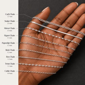 May include: A collection of nine silver-toned metal chains labeled with their specific styles and widths: Curb Chain 2.7 mm, Snake Chain 2.5 mm, Mirror Chain 1.5 mm, Figaro Chain 1.1 mm, Paperclip Chain 1.3 mm, Rolo Chain 1.2 mm, Box Chain 1.2 mm, Twist Chain 1.1 mm, and Cable Chain 0.9 mm.