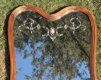 Unique Wall Mirror with Etched Details and Thin Curvy Wooden Frame