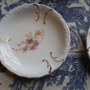 Set of Four White Ironstone Butter Pats with Faded Floral Transferware Pottery image 4