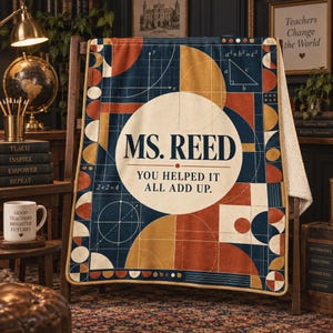 May include: A rectangular fleece blanket with a white sherpa lining, featuring a geometric pattern in navy blue, rust orange, and mustard yellow. The center displays a large circle with the text MS. REED YOU HELPED IT ALL ADD UP and math formulas.
