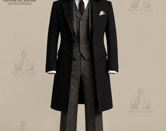 May include: A charcoal gray three-piece suit consisting of a long black overcoat with a velvet collar, a matching vest, trousers, a white dress shirt, a dark tie, a pocket square, and a flat cap. A gold pocket watch chain is attached to the vest.