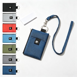 May include: A collection of rectangular card holders with a cross-hatch texture, each featuring a zip closure, a front pocket with a snap button, and a metal key ring. One blue card holder is attached to a matching blue fabric lanyard.