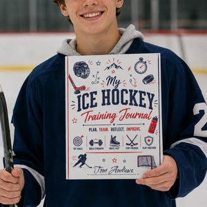 May include: A white rectangular training journal titled My Ice Hockey Training Journal with red and blue graphics including a helmet, hockey stick, stopwatch, puck, water bottle, and icons for goals, strength, skates, and teamwork by Tom Andrews.