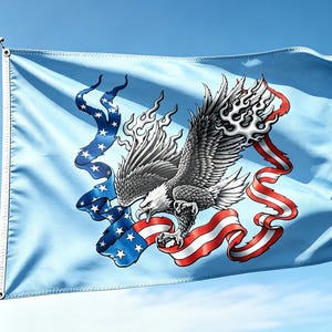 May include: A light blue flag featuring a central graphic of a detailed bald eagle with spread wings, surrounded by a flowing red, white, and blue ribbon element that incorporates stars and stripes, all mounted on a silver metal flagpole.