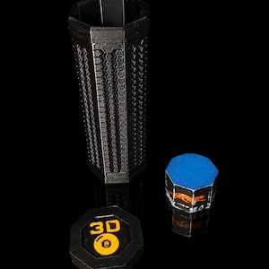 May include: A black hexagonal container with a textured geometric pattern on its exterior. Beside it are two hexagonal caps: one black cap featuring a yellow "3D" logo and an "8" ball graphic, and another cap with a blue top and an orange animal graphic.