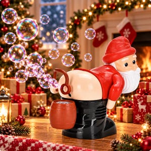 May include: A plastic Santa Claus bubble machine featuring a red hat and coat, white beard, and black boots. The figure is bent over, blowing iridescent bubbles from a small brown barrel-shaped attachment positioned at the rear of the device.
