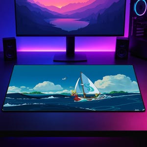 May include: A rectangular desk mat featuring a vibrant illustration of a small red boat with a white sail marked with a teal symbol, sailing across a deep blue ocean under a clear sky with white clouds and birds, set against a dark gaming setup.