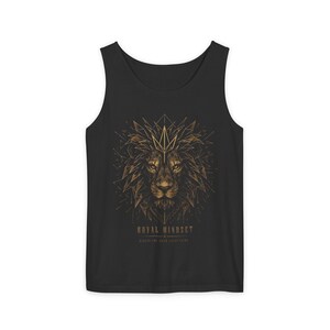 May include: A black tank top featuring a gold-toned geometric lion head graphic with a crown above it. Below the lion, the text reads ROYAL MINDSET and DISCIPLINE OVER EVERYTHING in a clean, capitalized font centered on the chest area.