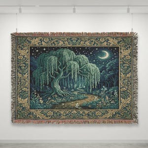 May include: A rectangular woven tapestry blanket featuring a central scene of a large weeping willow tree in a forest at night under a crescent moon and stars. The border is decorated with intricate gold and green floral and leaf patterns.