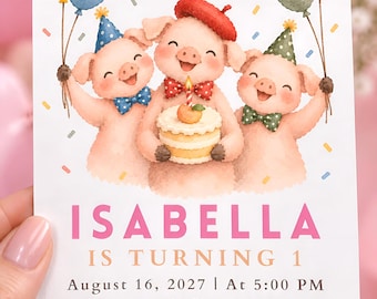 Könnte beinhalten: Eine Geburtstagseinladungskarte mit drei illustrierten Schweinen, die Partyhüte und ein rotes Barett tragen und Luftballons sowie einen Kuchen halten. Der Text lautet: ISABELLA IS TURNING 1, August 16, 2027, at 5:00 PM, The Sovereign Grand Ballroom, 7420 Westheimer Road, Suite 1500, Houston, TX 77063, RSVP: 555-486-7452.